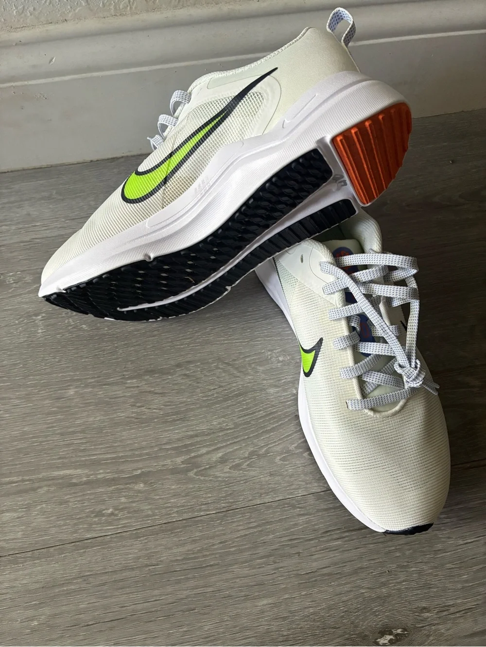 Nike Kids White Sneakers with Neon Lime Swoosh and Blue-White Laces